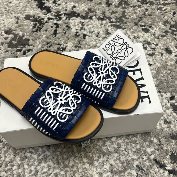 Loewe Shoes - LOEWE
Anagram Bicolor Woven Flat Sandals